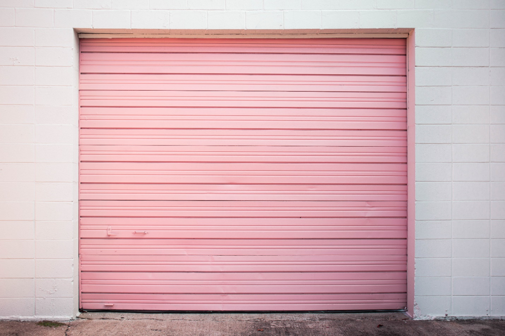 Pink-colored garage door.
