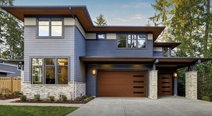 Blue-Grey House with a Wooden Garage Door