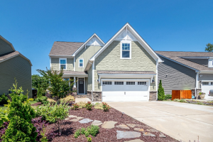 Front view of a house with a garage door