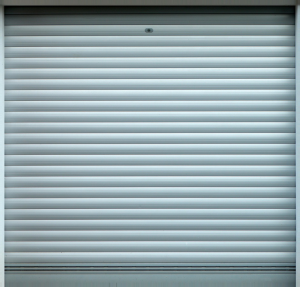 A stylish modern garage door installed on a residential home